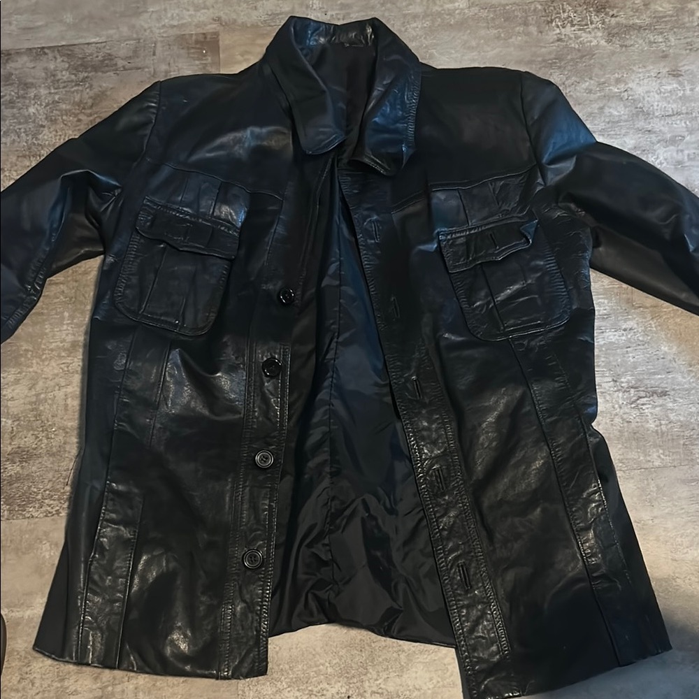 Sleek Black Leather Jacket with Pockets